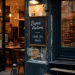 Dame Nation Paris : restaurant et bistro-cave, salle vitrée, ardoise carte du midi