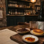 Dame Nation Paris : cuisine du marché et vins natures, bouteille et assiettes
